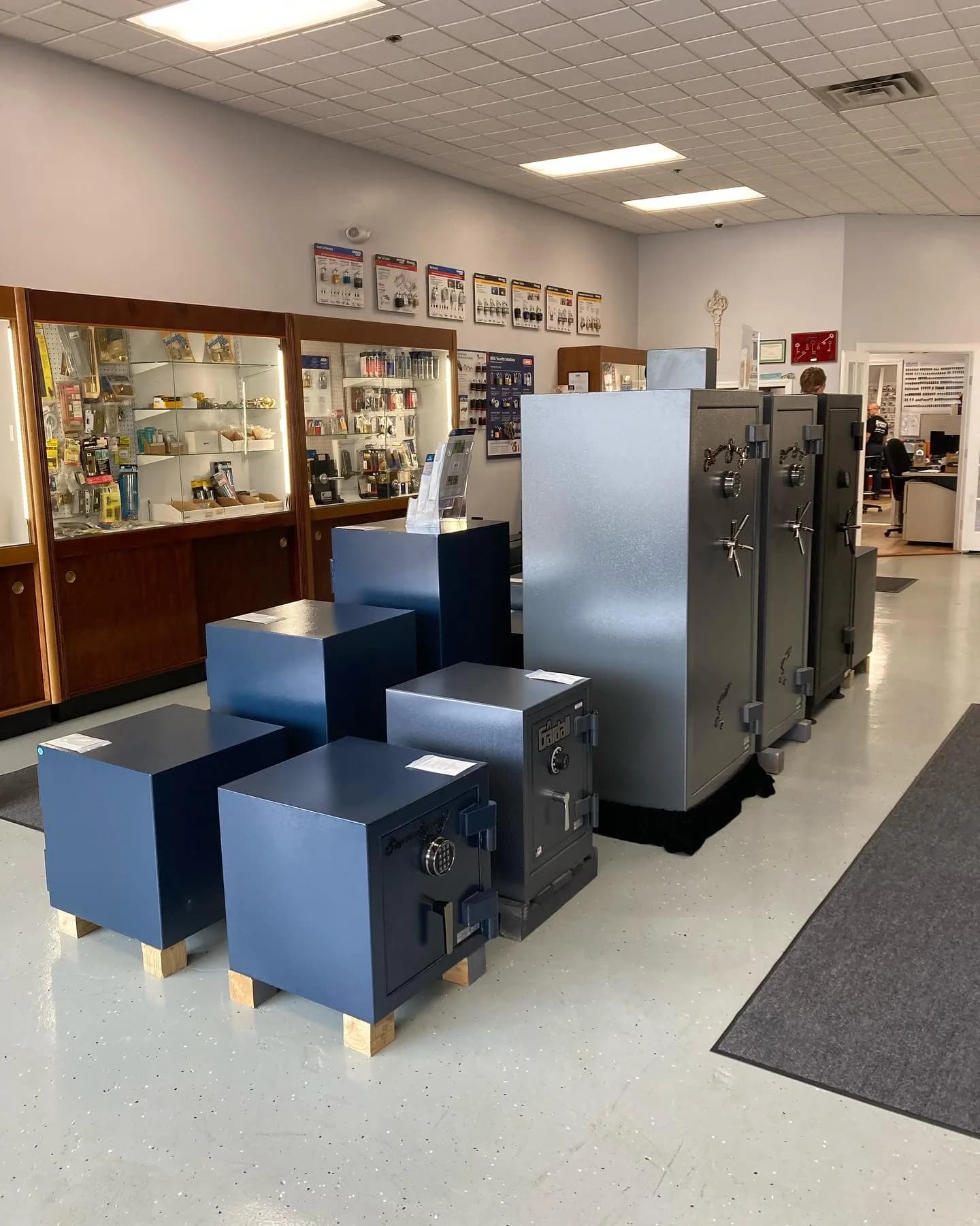 Inside the Southington Security showroom, with safes displayed beside the key and hardware counter